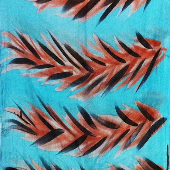 Blue textile print with orange leafs