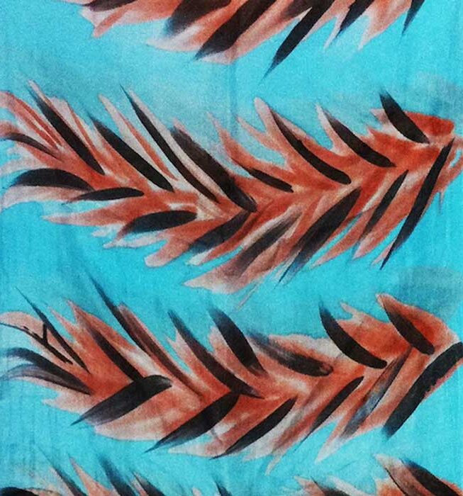 Blue textile print with orange leafs