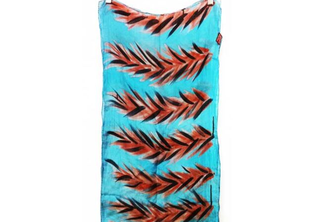 Blue textile print with orange leafs