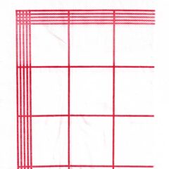 Napkin with a big red and white caro pattern