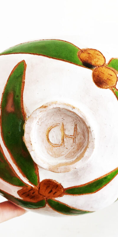 Ceramic bowl in white with green leafs